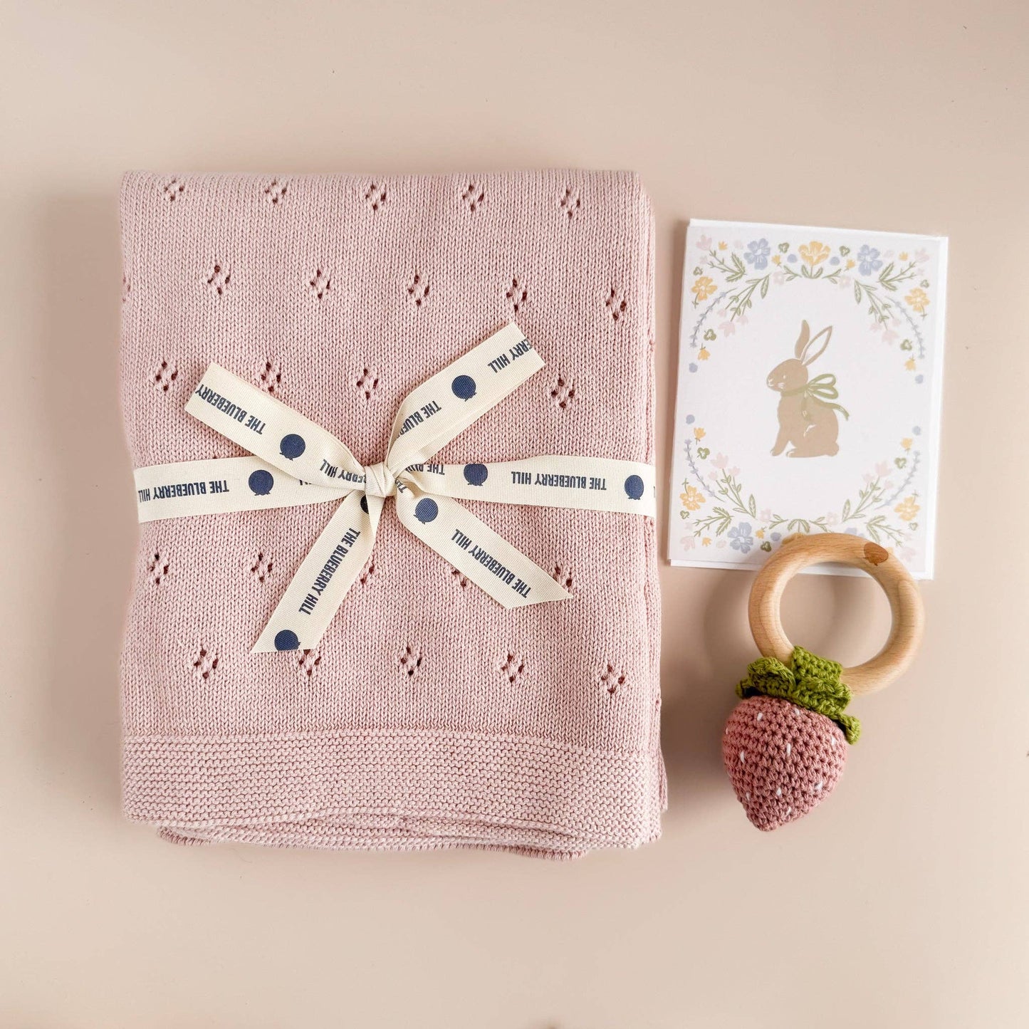 pastel bunny card with blanket and rattle 