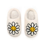 Slippers with white daisies with yellow smiley face center