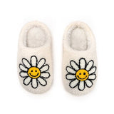 Slippers with white daisies with yellow smiley face center