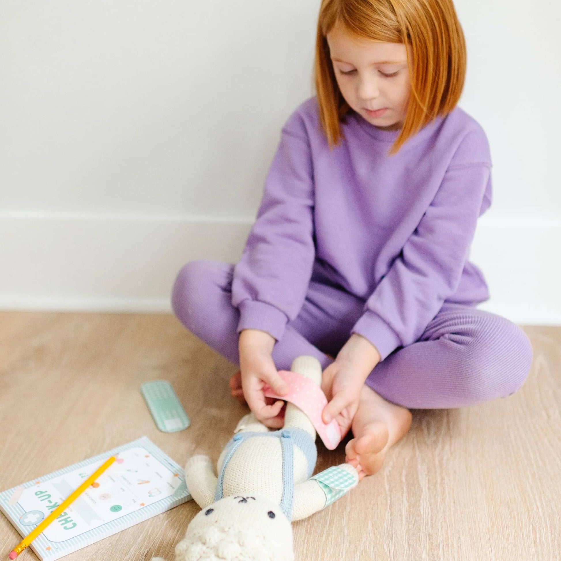 Girl playing with play pad