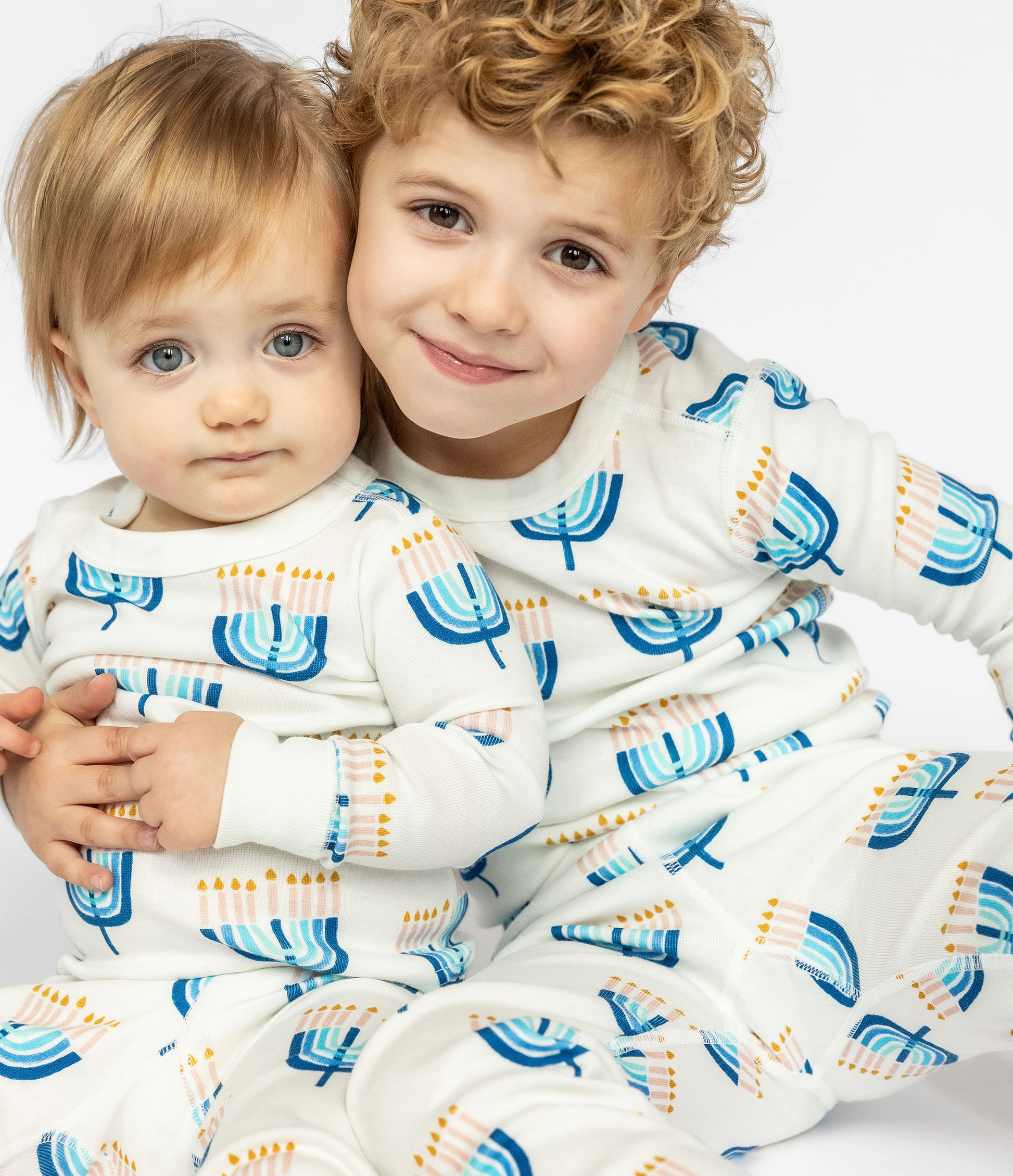 two boys in hanukah pajamas