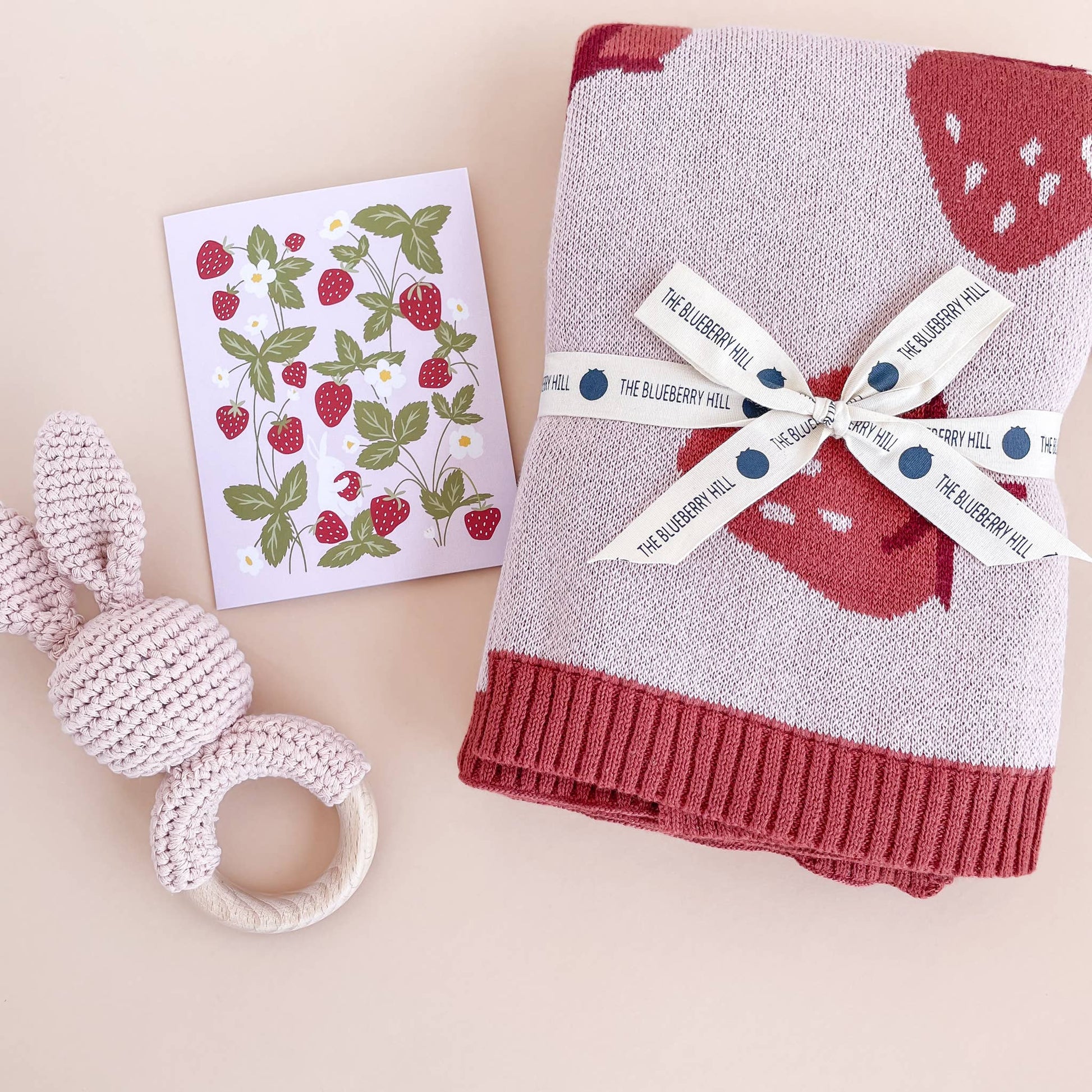 strawberry print card with rattle and blanket 