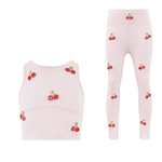 Pink children's tank top and leggings set with cherry pattern on a white background