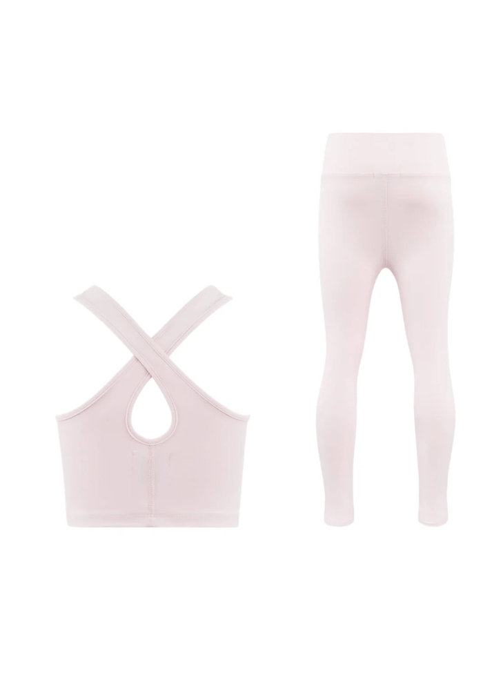 back view of Light pink crop top and leggings set on a white background