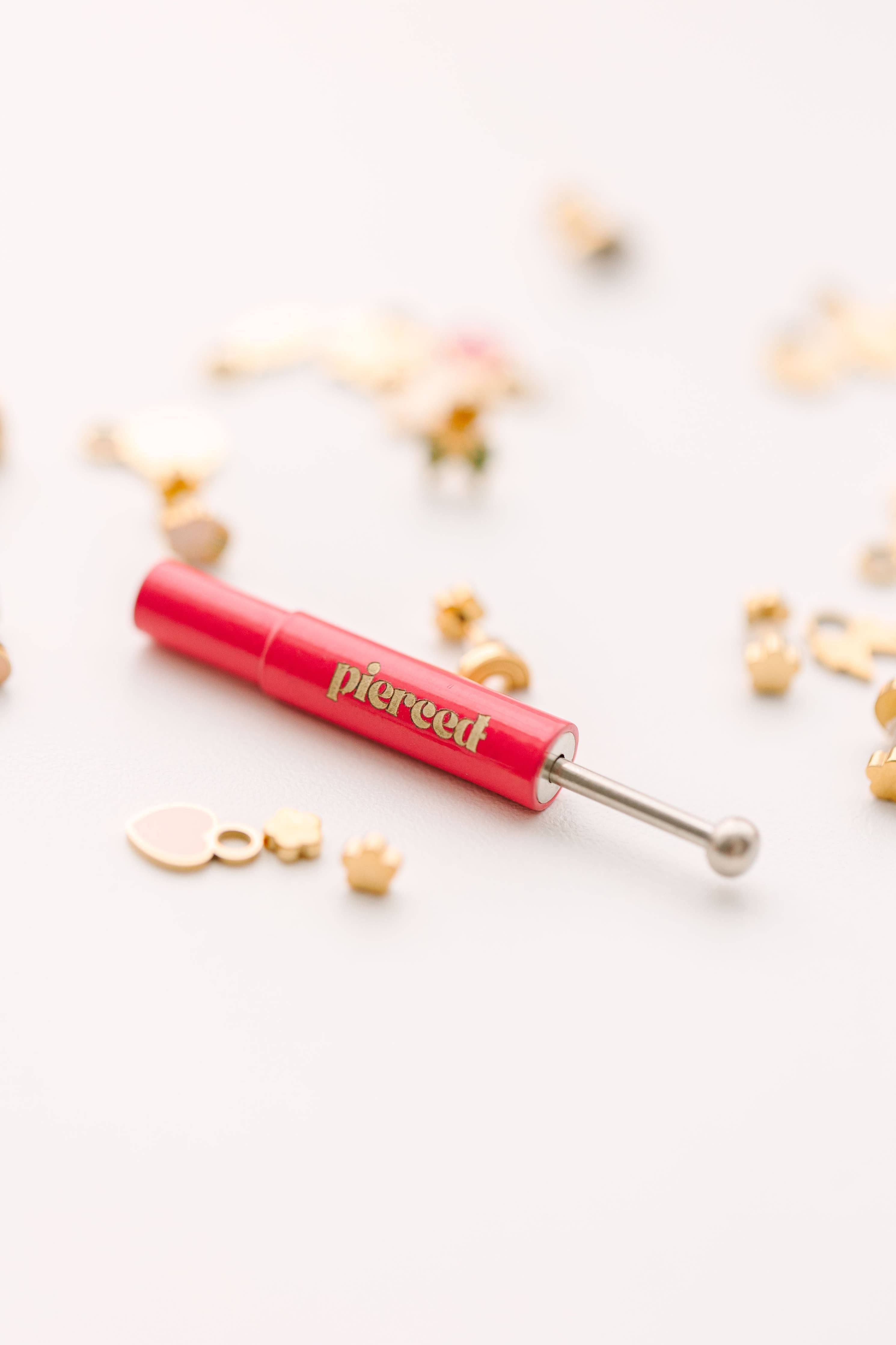 earring back tool  and white background
