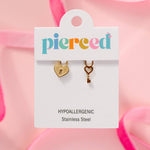 Heart lock and key charm for hoop earrings on a 'pierceed' branded card with pink background
