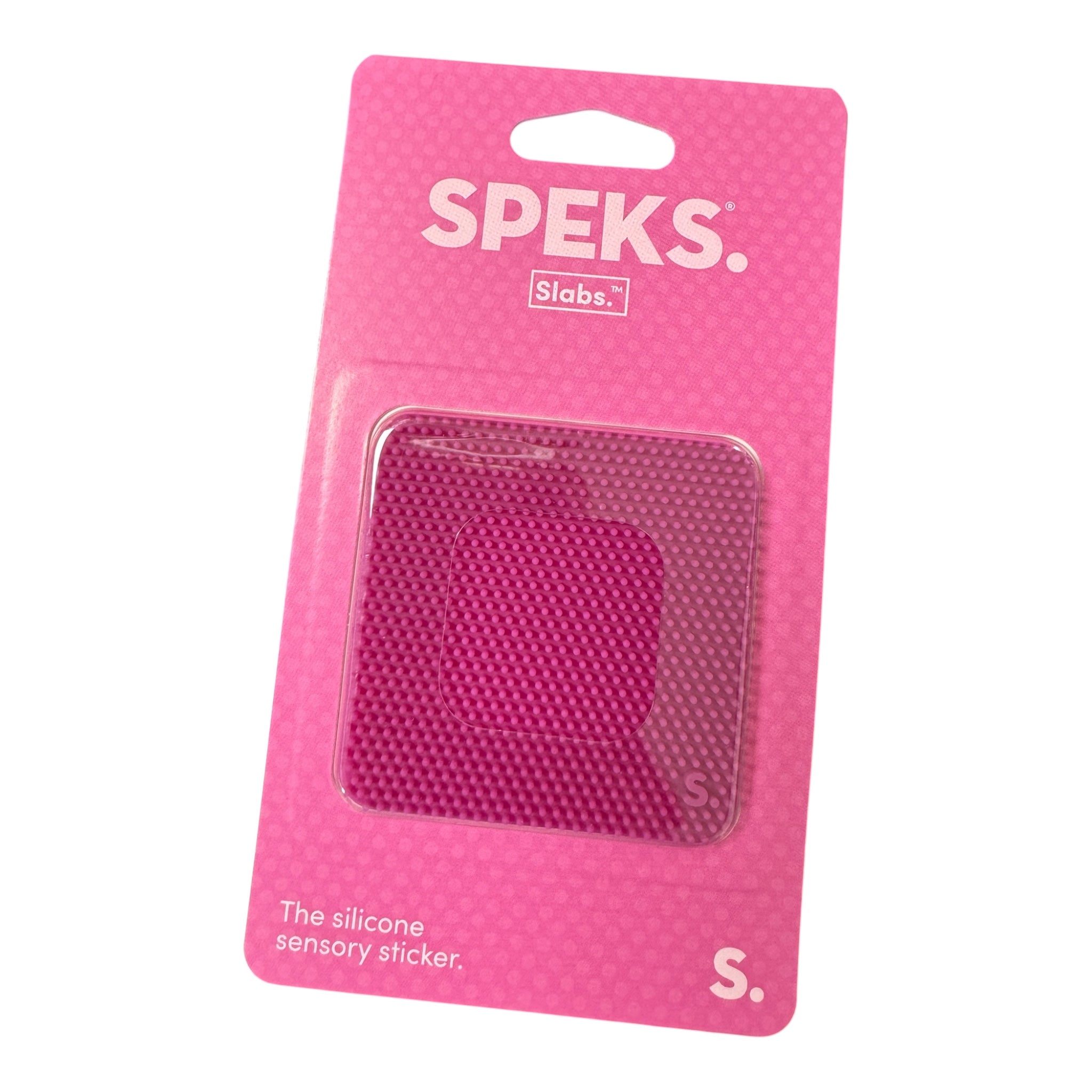 Pink packaging of Speks Slabs silicone sensory sticker on a white background