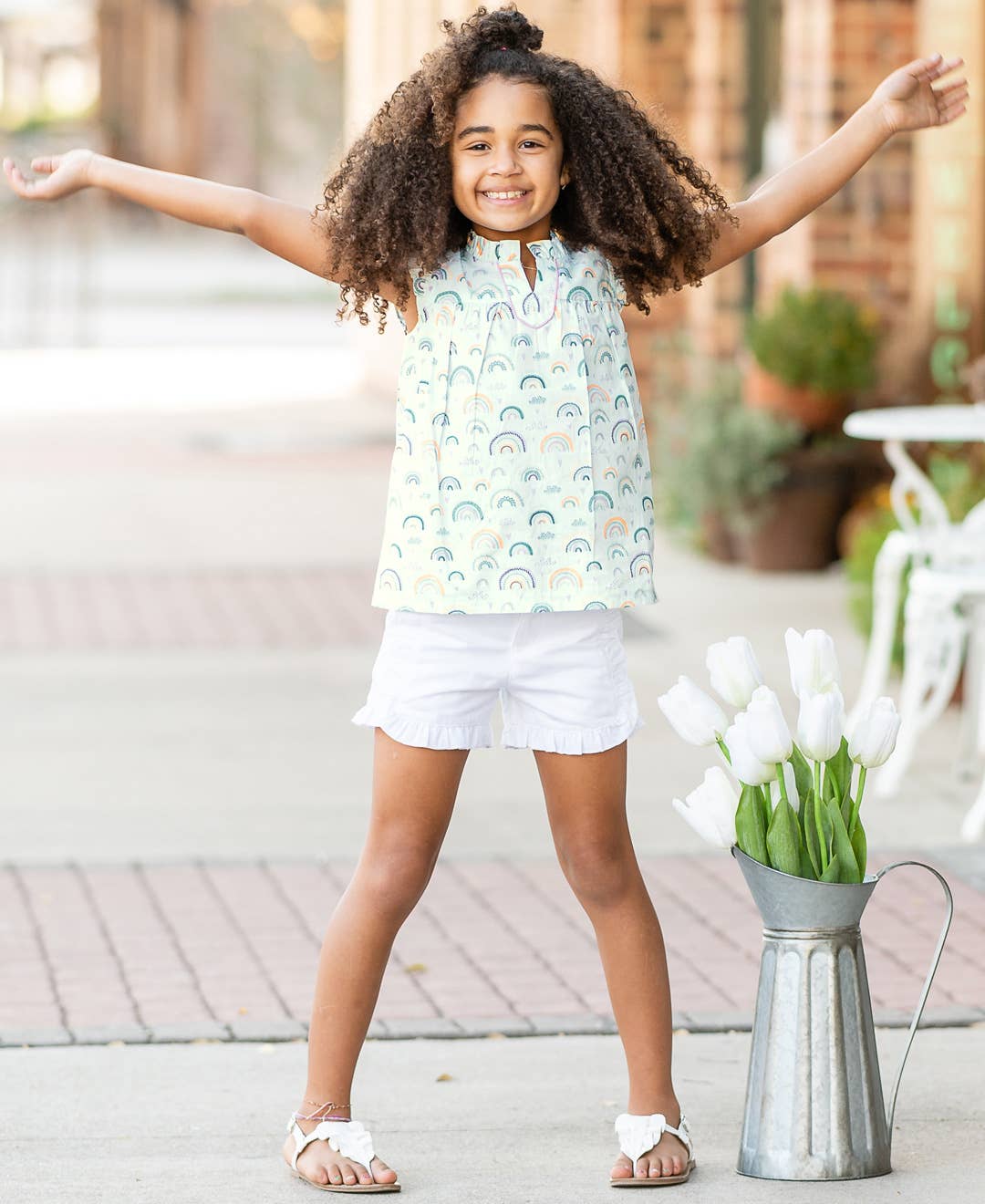 Girl wearing white shorts