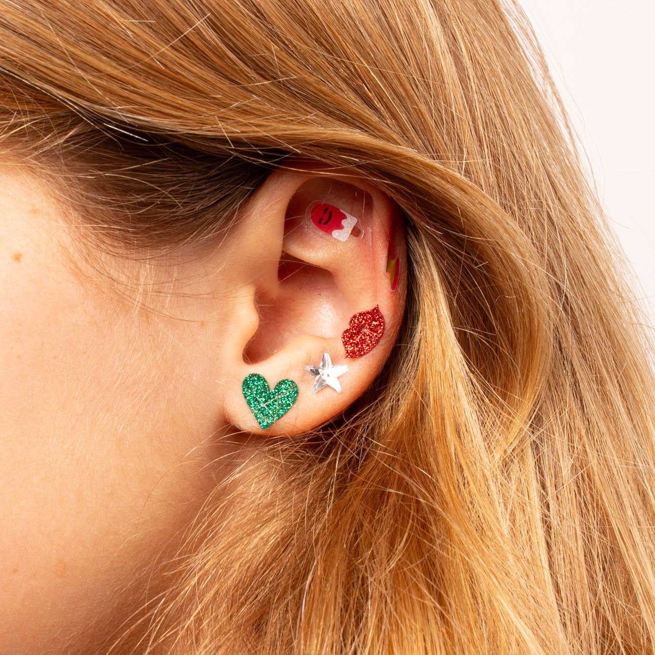 stick on earrings on ear