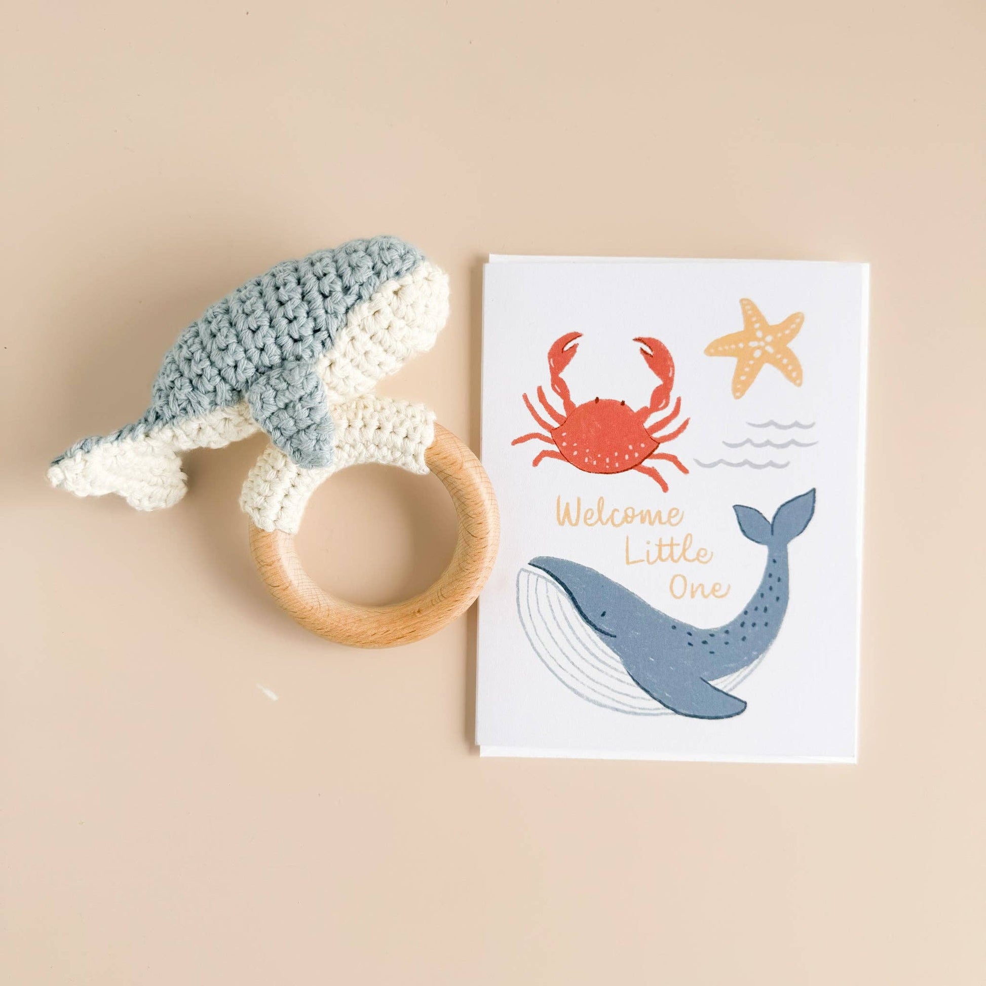 sweet nautical greeting card, welcome little one with whale rattle 