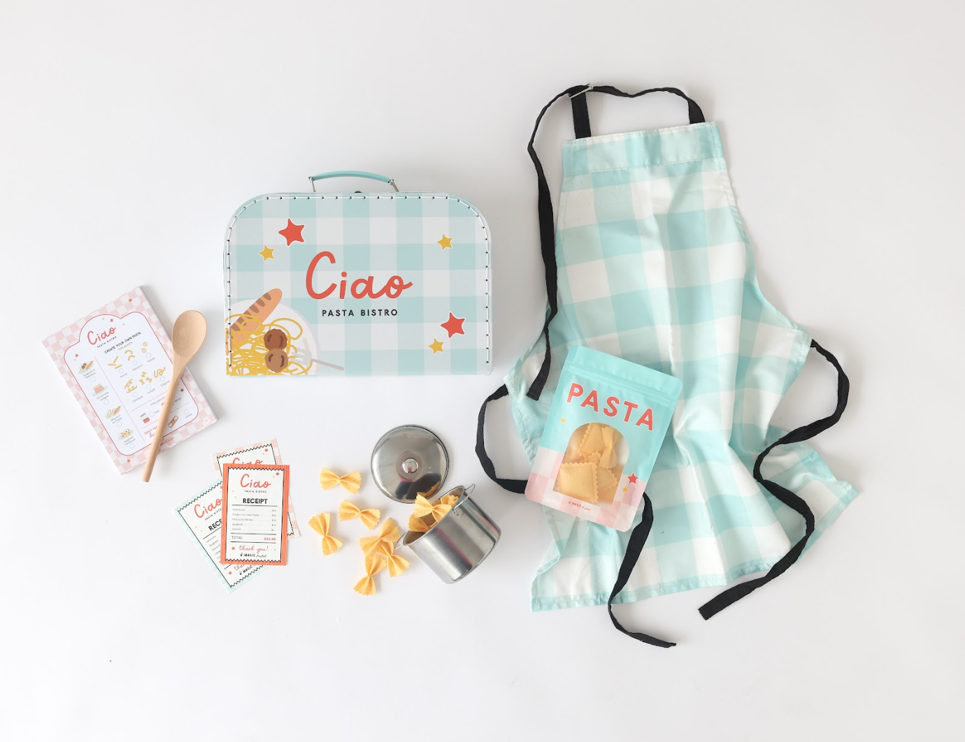 play kit with apron, pretend pasta, pot, spoon and recipe cards