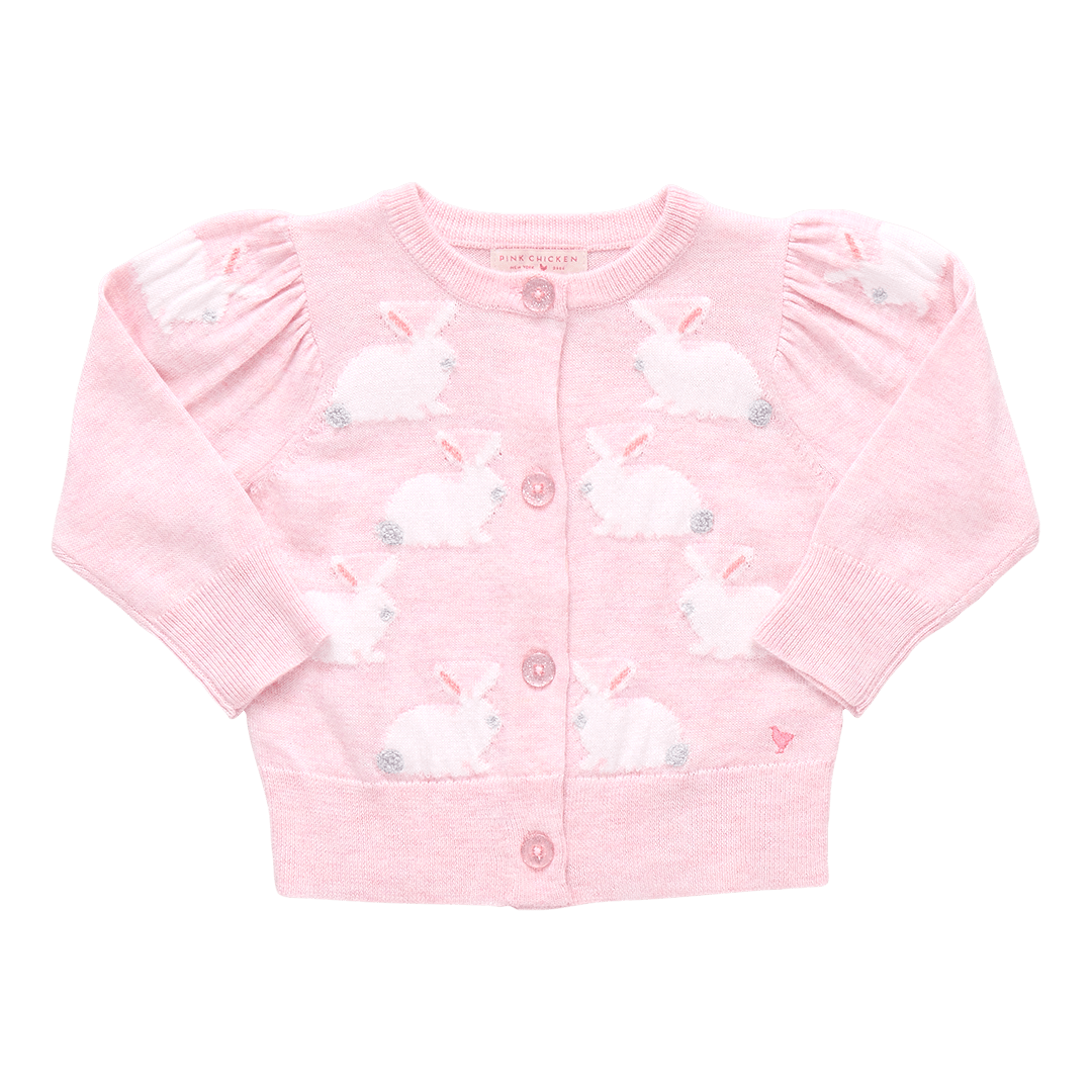 Pink cardigan with white bunnies and fluffy gray tails