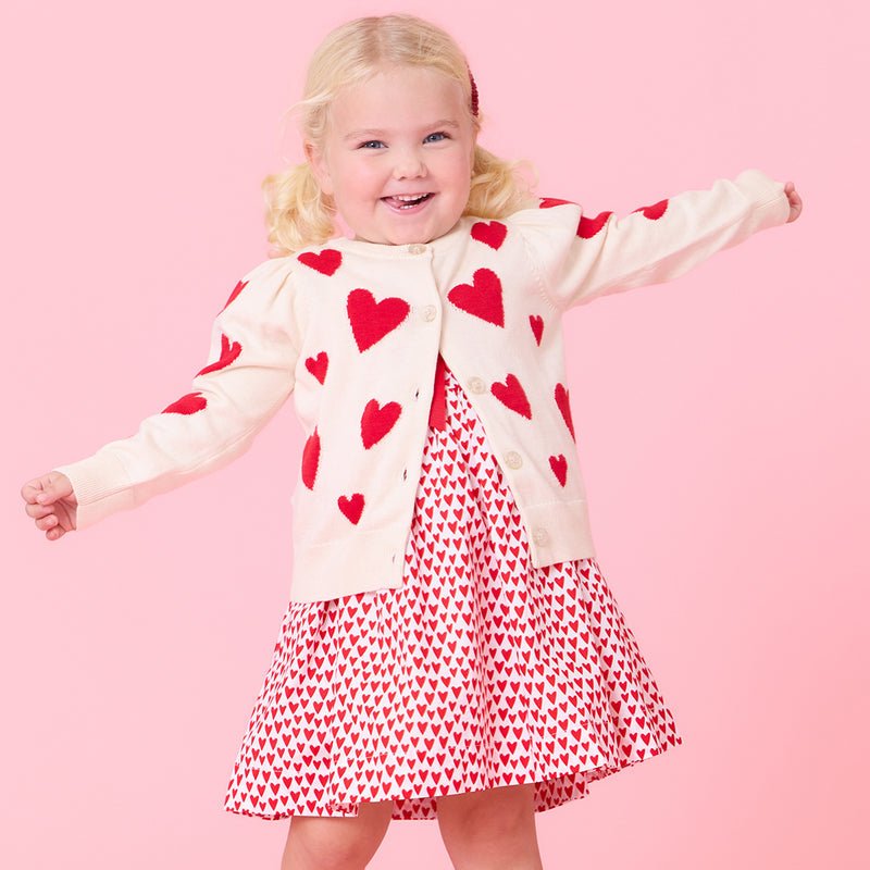 Girl wearing heart sweater