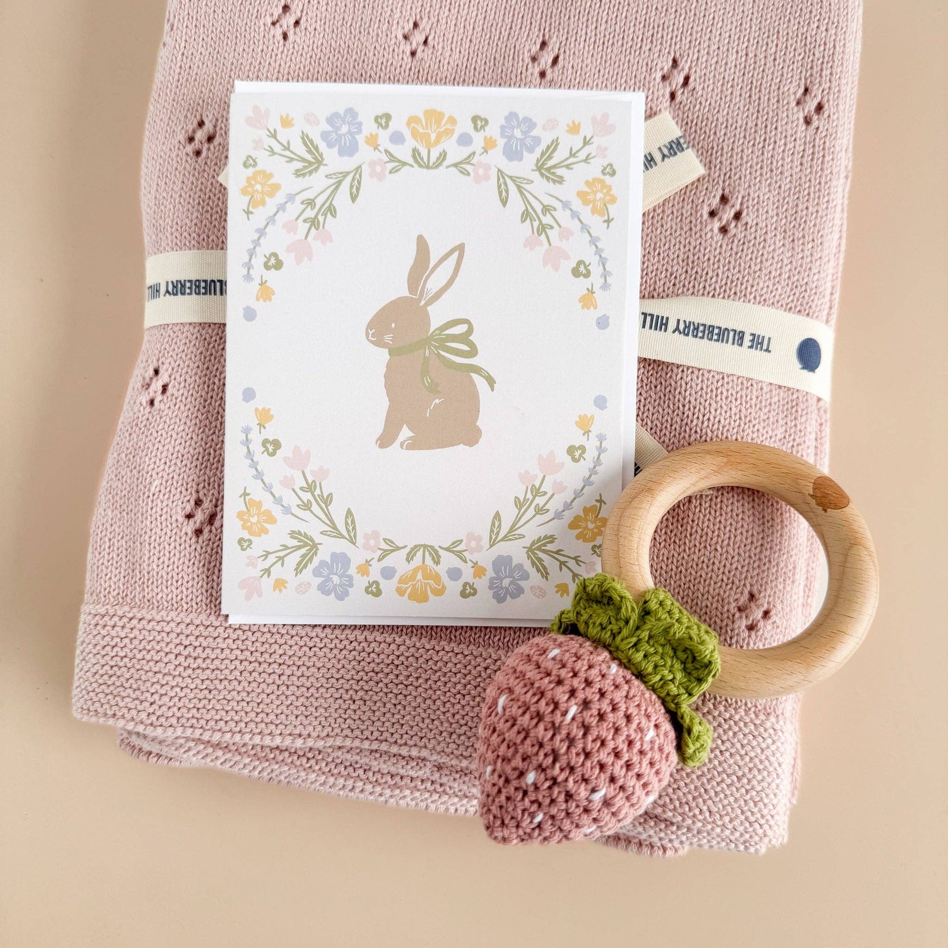 pastel bunny card with blanket and rattle 