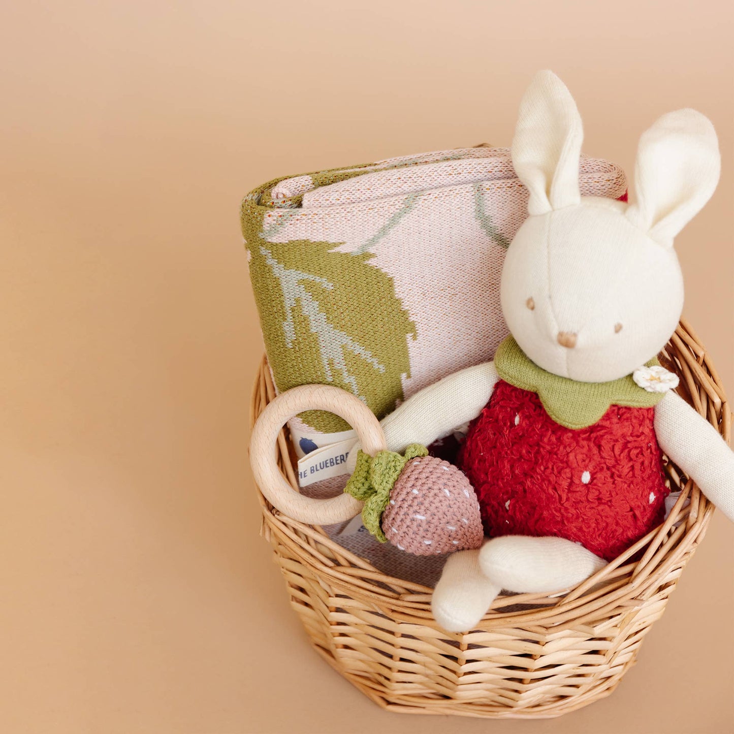 strawberry blanket in basket 