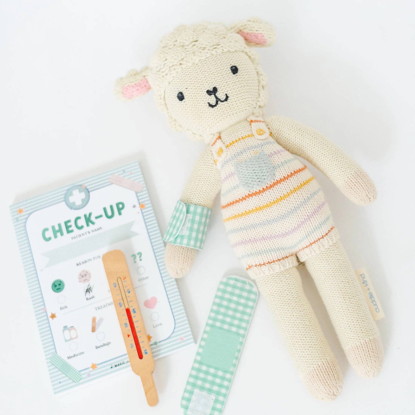 check up play pad with sheep stuffed animal patient