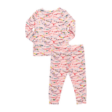 light pink long sleeved pajama set with colorful friendship bracelets