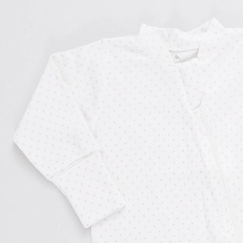 Light pink polka dot onesie
